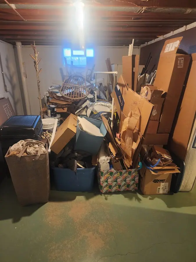 Roll-off dumpster container at job site for 20 Yard Dumpster Rental in Rowley